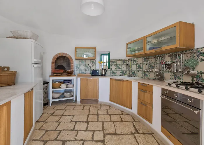 别墅 Trulli Il Cappero By Perle Di Puglia 奥斯图尼